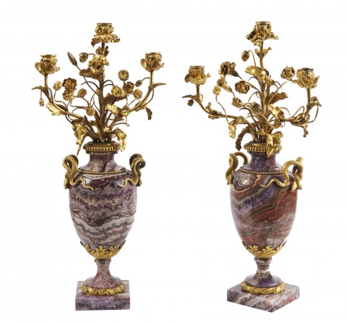 A pair of French bluejohn vases mounted as candelabra circa 1830