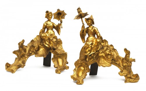 A pair of French Louis XV period chenets with Chinese figures