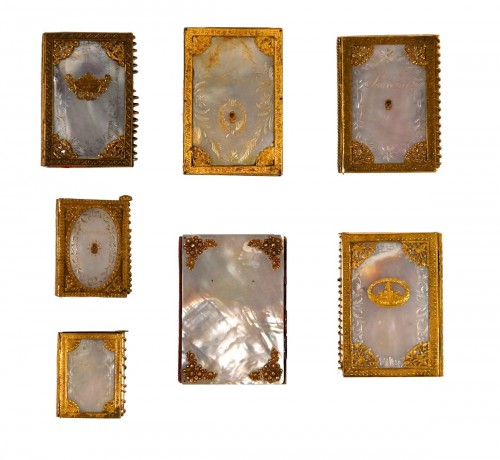 A collection of seven French Charles X mother of pearl cases