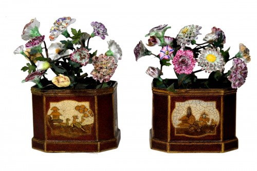 A pair of French Louis XV painted tole planters