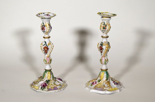 Decorative Objects  - A pair of English George III Battersea enamel candlesticks