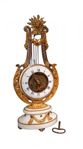 Pendule " lyre" Louis XVI en bronze doré et marbre