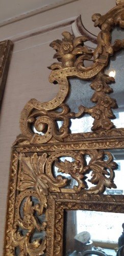Miroir en bois sculpté, doré d'époque Régence - Régence