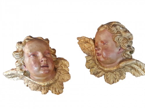 Paire de têtes d'ange en bois sculpté d'époque Louis XV