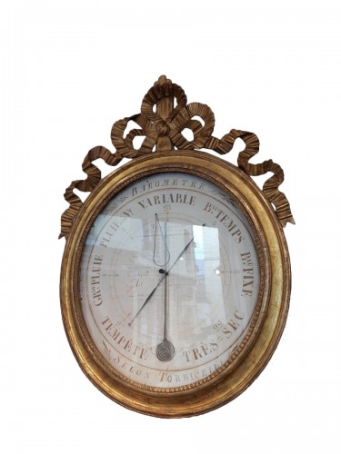 Barometer in carved and gilded wood of Louis XVI period