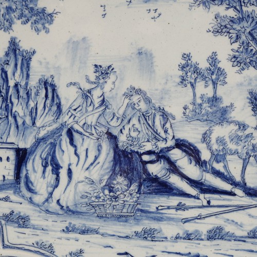 Céramiques, Porcelaines  - Grande plaque en faïence de Delft scène galante XVIIIe siècle