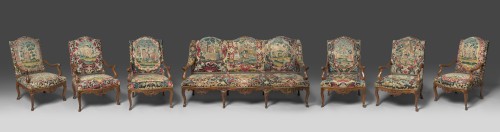 Rare suite of six Regence armchairs and a settee