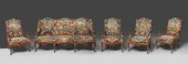 Rare salon composé d'un canapé et quatre larges fauteuils d'époque Régence