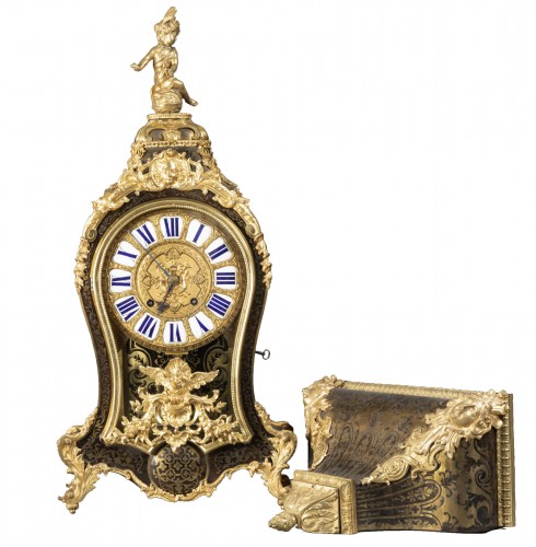 Cartel and its console of applique of the beginning of the time Louis XV