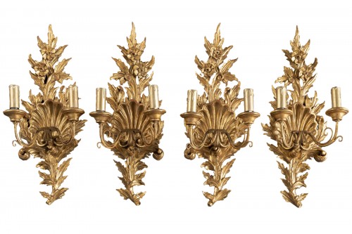 Suite of 4 gilt wood sconces from the end of the 18th century.