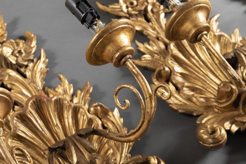 Antiquités - Suite of 4 gilt wood sconces from the end of the 18th century.