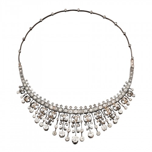 Draped necklace in gold, silver, and diamonds.