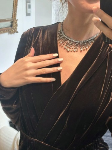 19th century - Draped necklace in gold, silver, and diamonds.
