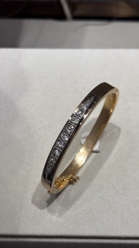 Bijouterie, Joaillerie Bracelet - Bracelet rigide ouvrant en or et diamants