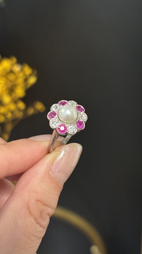 Antique Jewellery  - A platinum, natural pearl, ruby, and diamond ring, circa 1920.
