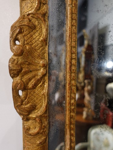 Antiquités - Miroir en bois doré d'époque Régence