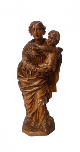 Virgin and Child in carved wood from the 18th century