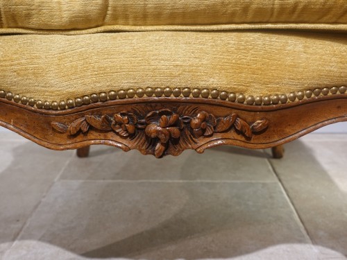 18th century - Large Louis XV wing chair in walnut from