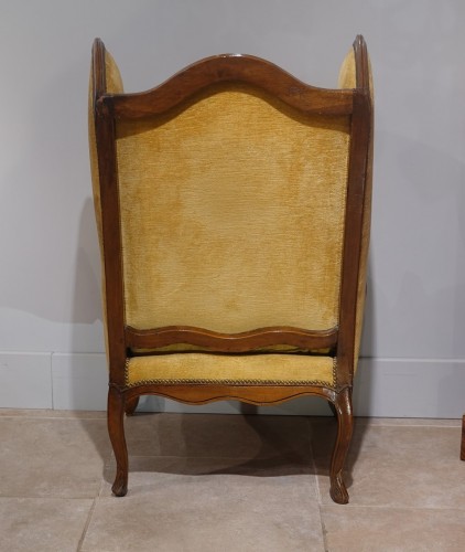 Louis XV - Large Louis XV wing chair in walnut from