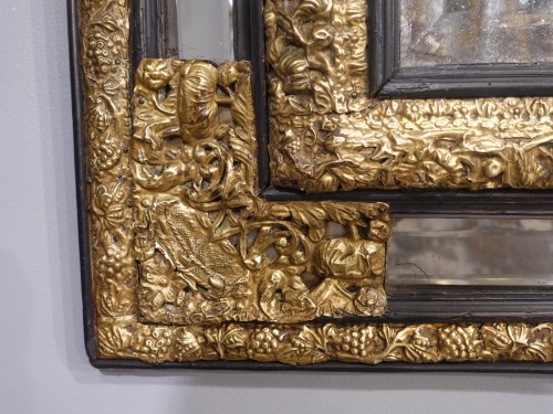 17th century - 17th Century Ebonized Wood and Embossed Brass Mirror