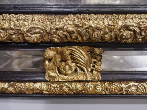Louis XIV - 17th Century Ebonized Wood and Embossed Brass Mirror