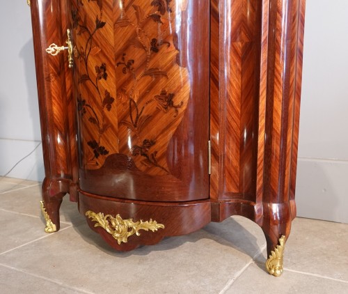 Louis XV - A Carel-stamped floral marquetry corner cabinet