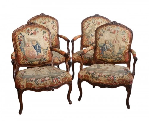 A set of four Louis XV  ''à la Reine''  armchairs