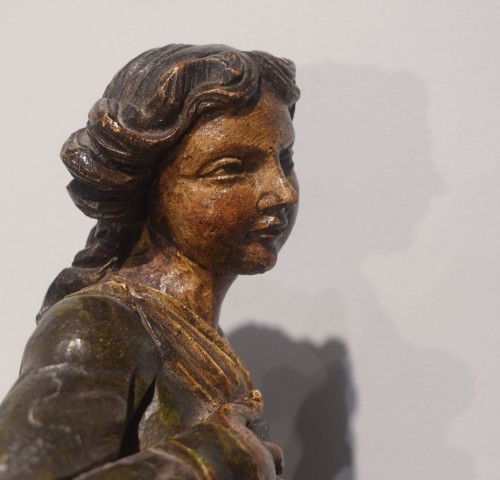 Sculpture  - 18th-century wood sculpture: "Woman Sowing"