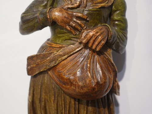 18th century - 18th-century wood sculpture: "Woman Sowing"