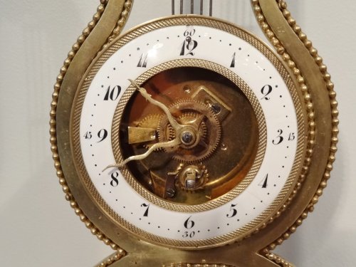 A 19th century  lyre-shaped clock - Horology Style 