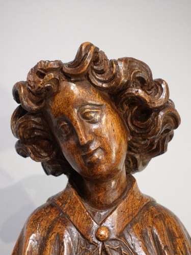 11th to 15th century - Angel Gabriel in carved walnut, last quarter of the 15th century