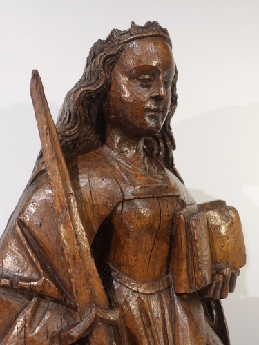 Antiquités - Sainte Catherine en chêne sculpté – XVe siècle