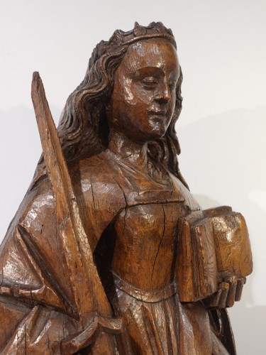 Antiquités - Sainte Catherine in carved oak - 15th century