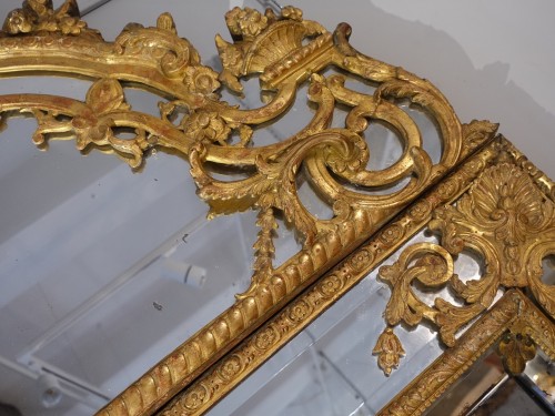 Antiquités - Large Regency mirror with glazing beads in gilded wood, 18th century