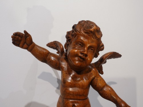 XIXe siècle - Paire d'angelots ou putti en bois sculpté début XIXe