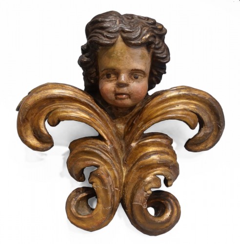 Tête d'angelot en bois polychrome d'époque XVIIe