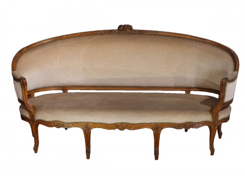 Louis XV sofa in walnut, attributed to Sébastien Carpantier (1770)