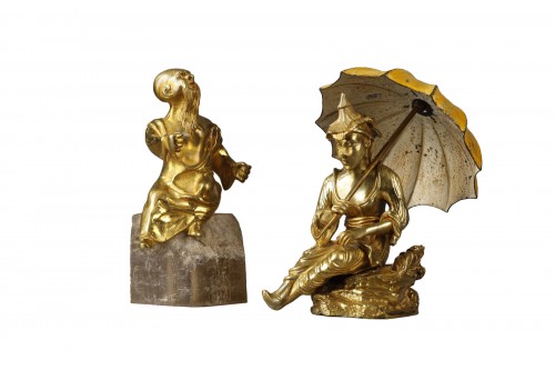 Pair of Chinese character statuettes