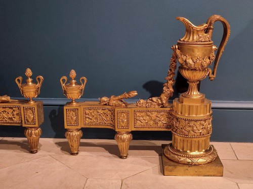 Antiquités - Pair of Louis XVI andirons in gilt bronze