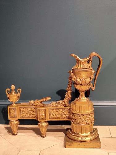 Antiquités - Pair of Louis XVI andirons in gilt bronze