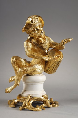 Decorative Objects  - Pair of gilded bronze statuettes representing musical monkeys