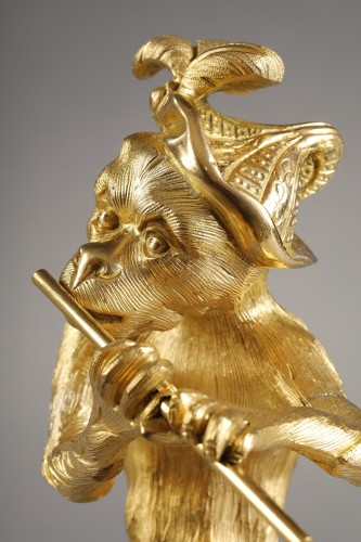 Antiquités - Pair of gilded bronze statuettes representing musical monkeys