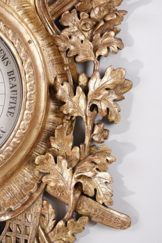 Louis XVI - Grand baromètre en bois doré aux attributs de la chasse, époque Louis XVI