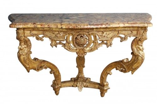 Console murale à têtes de grotesques d'époque Régence