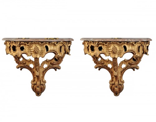 Large pair of gilded wood consoles