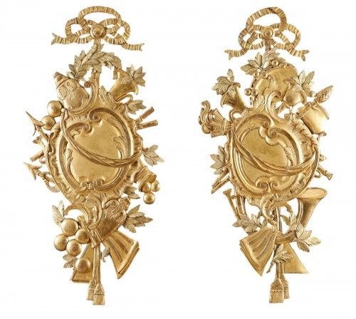 Pair of large 18th-century giltwood trophies