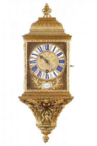 Small alcove clock in brass and gilt bronze from the Louis XV period, Signe