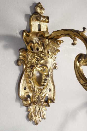 Luminaires Appliques - Importante paire d’appliques Régence aux mascaron