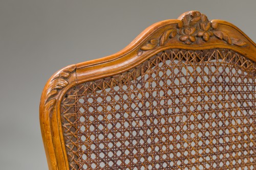Paire de fauteuils cannés d’époque Louis XV, attribué à Nogaret - Louis XV