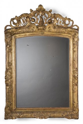 A French Regence period giltwood mirror